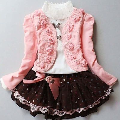 0-9Y Ruffle Tracksuit -Pink embroidered jacket over a white top and brown polka dot skirt on a light gray background