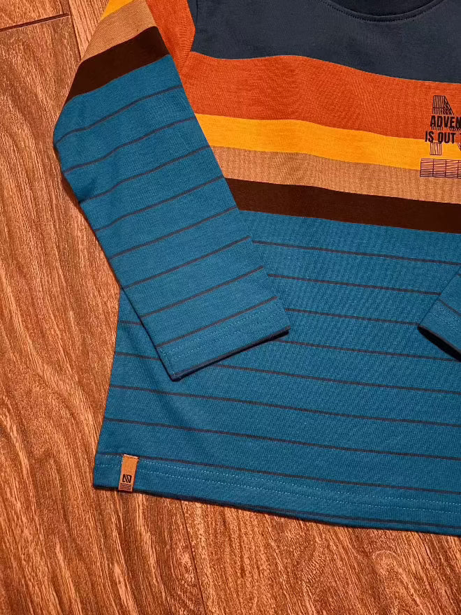 Boys Long Sleeve T-Shirt Navy-Blue long-sleeve shirt with striped pattern on a wooden surface
