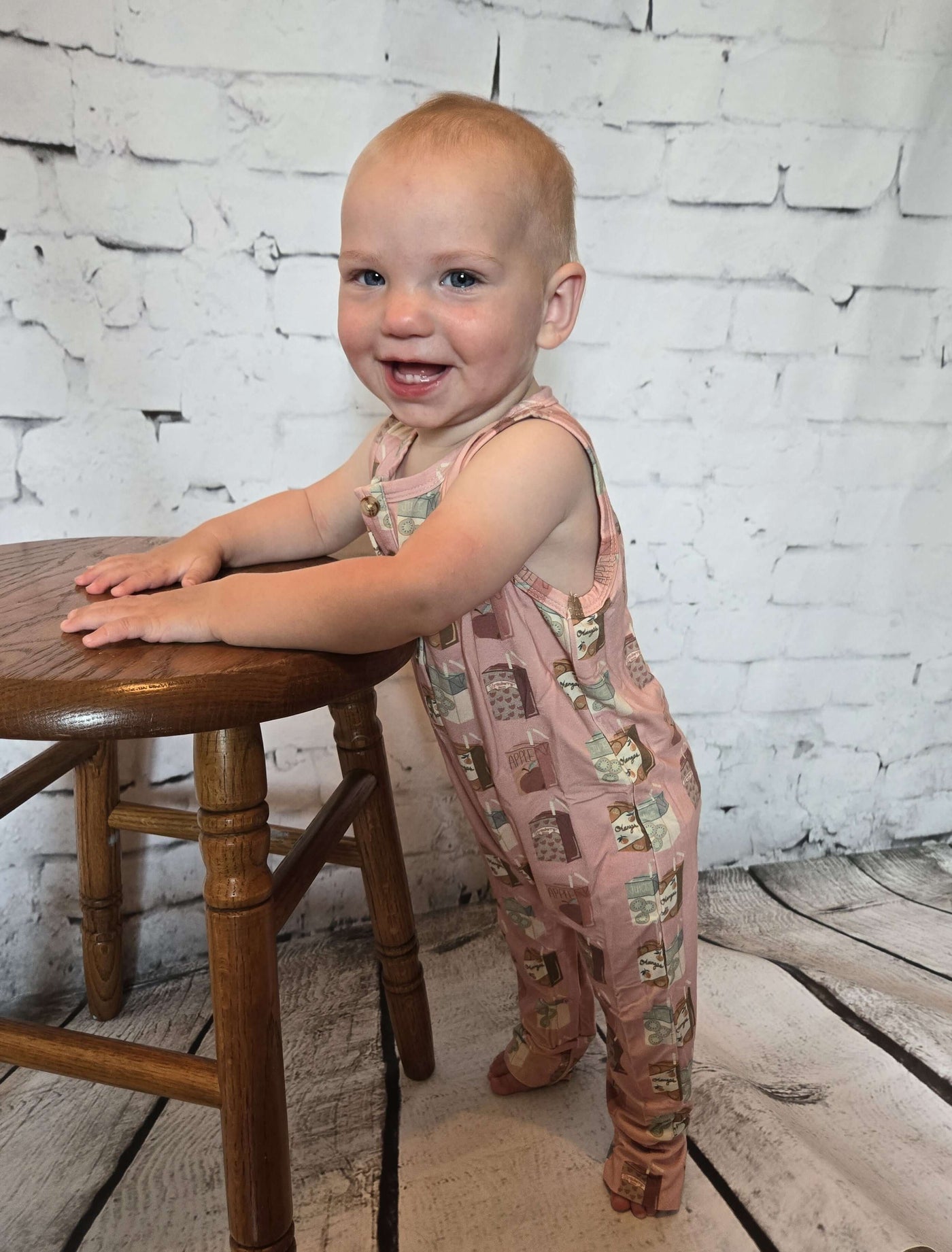 Girls_Henley_Tank_Romper_for_Infant_with_Juice_In_the_Box_Pattern_-_Lydia standing