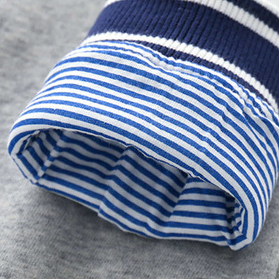 Boys Knit Cardigan Jacket-Close-up of blue and white striped socks on a gray background