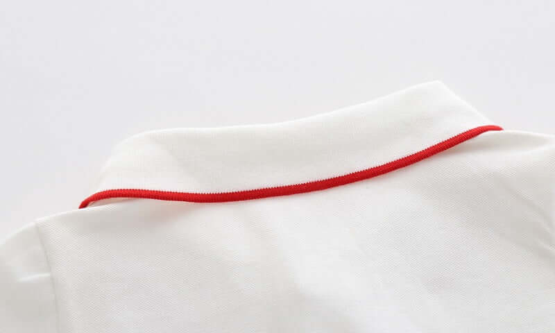 Cartoon Car Boys Short Sleeve Polo Shirt-Close-up of a white fabric with a red thread on a light gray background