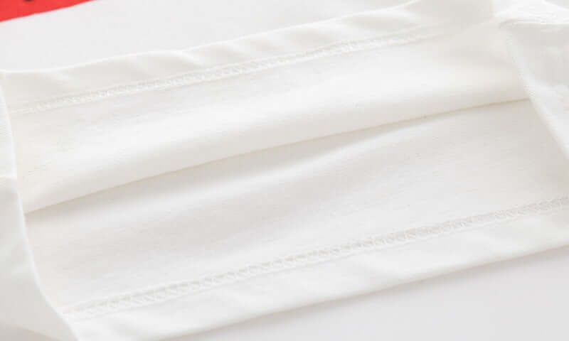 Cartoon Car Boys Short Sleeve Polo Shirt-Close-up of white fabric with folds on a white background