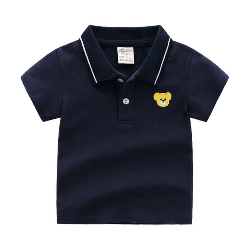 Cartoon Childrens Shirt -Navy blue polo shirt with a yellow bear face emblem on a white background