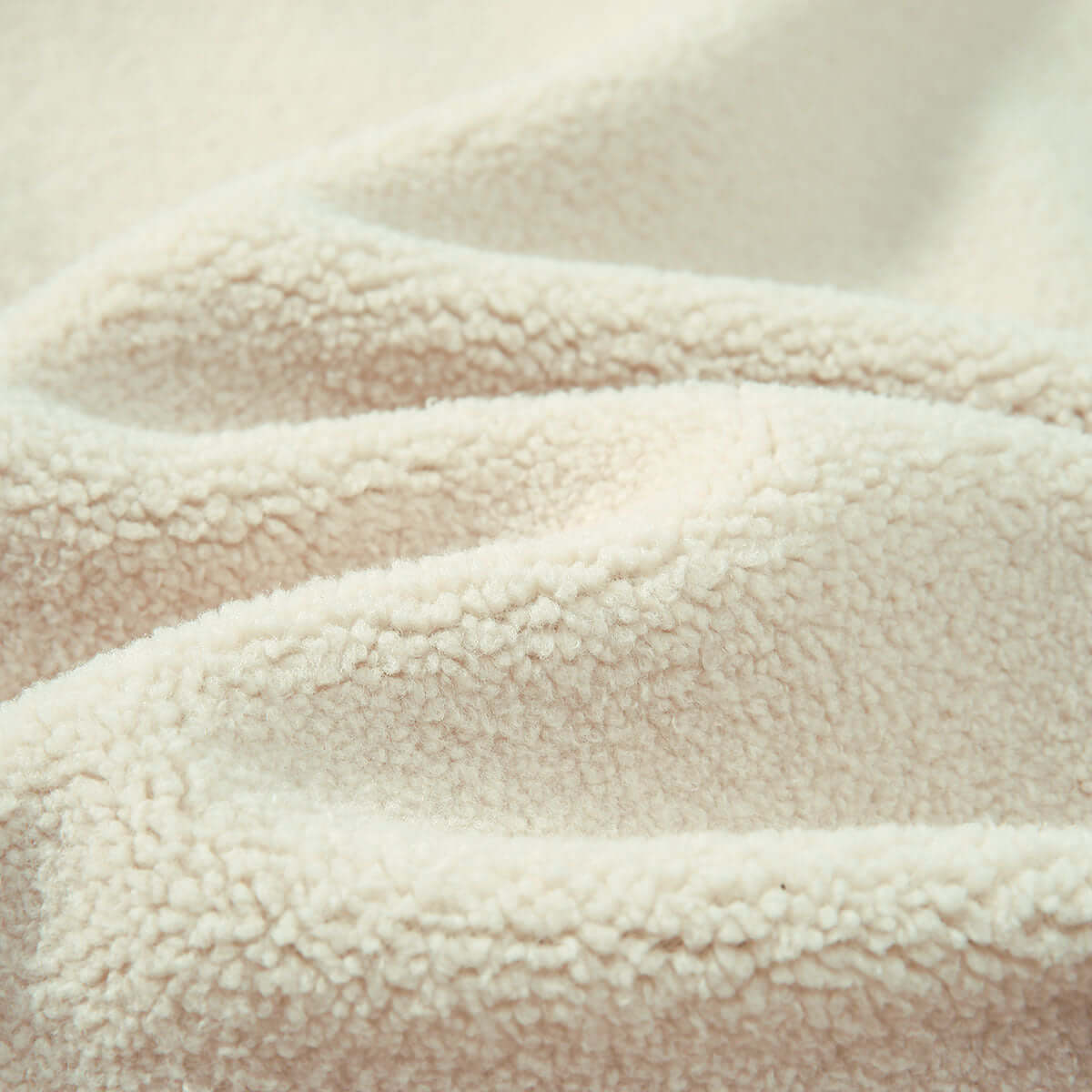 Casual Cardigan-Close-up of beige fleece fabric texture
