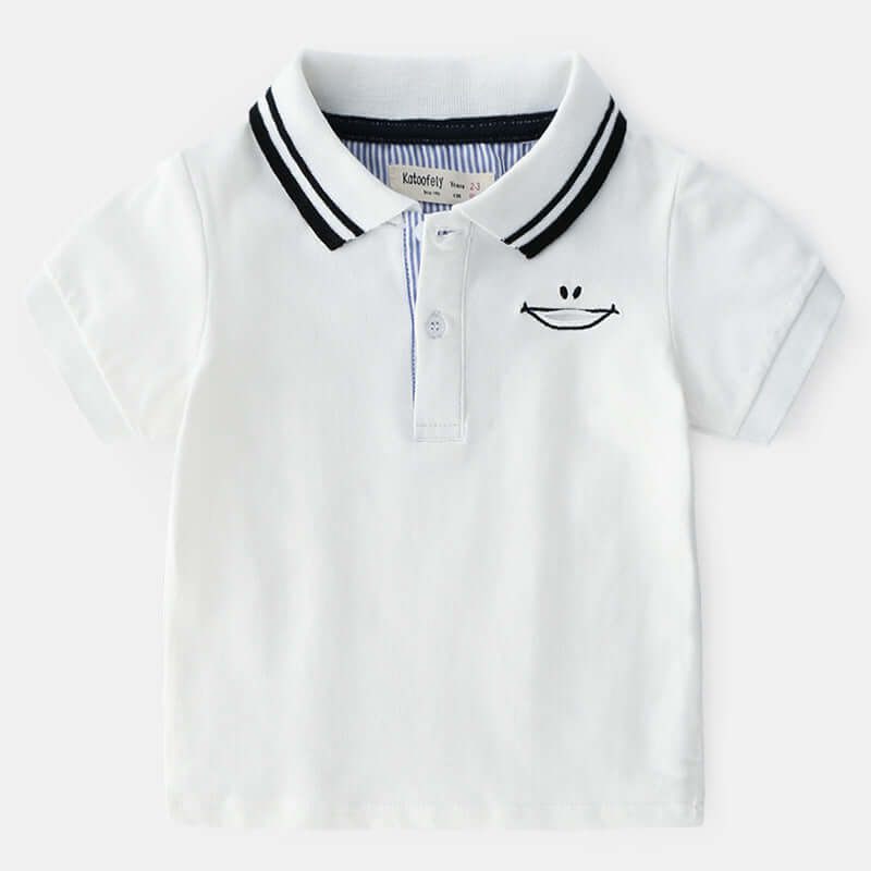 Childrens Polo Shirt -White polo shirt with a smiley face design on a white background