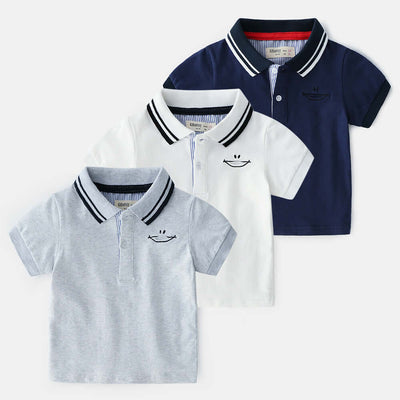 Childrens Polo Shirt -Three children's polo shirts in white, gray, and navy on a white background