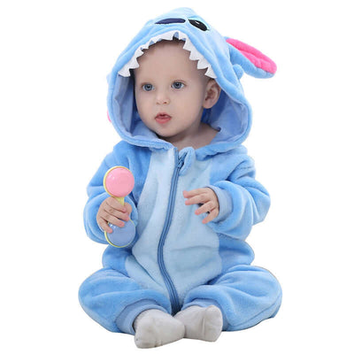 Flannel bodysuit-Baby in a blue shark-themed onesie holding a pink toy on a white background