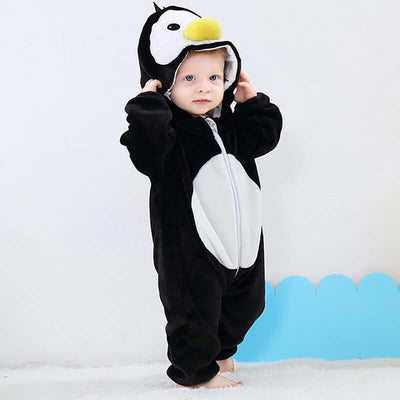 Flannel bodysuit-Child wearing a penguin onesie against a light gray background