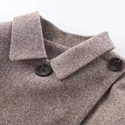 Girls Pleated Short Skirt-Close-up of a gray coat with a collar and buttons on a white background
