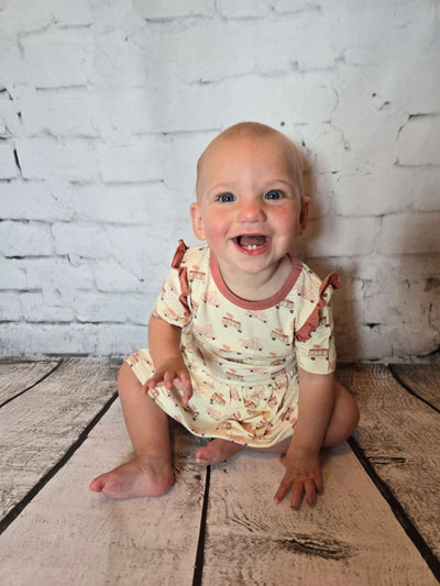 Infant_Bodysuit_Dress_-_Lydia_sitting
