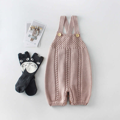 Knitted woolen bodysuit-Knitted baby romper with cartoon glove and hair clip on a light gray background