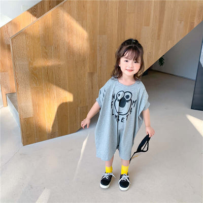 Loose Casual Short Sleeve Top-Child wearing a gray dress with a cartoon character, standing indoors.