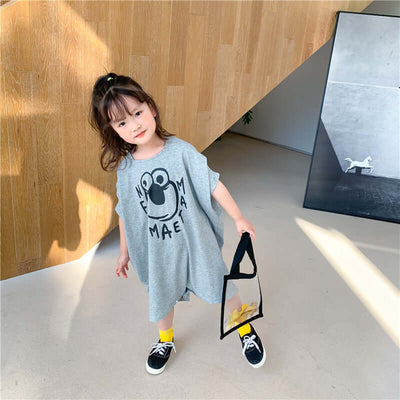 Loose Casual Short Sleeve Top-Child wearing a gray dress with a graphic design, standing indoors.
