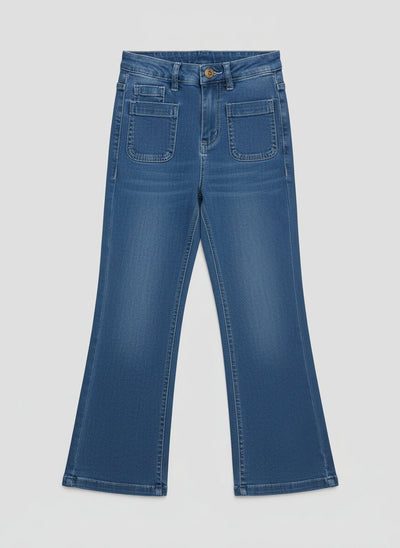 Thea_Jeans-Pair of blue jeans on a white surface