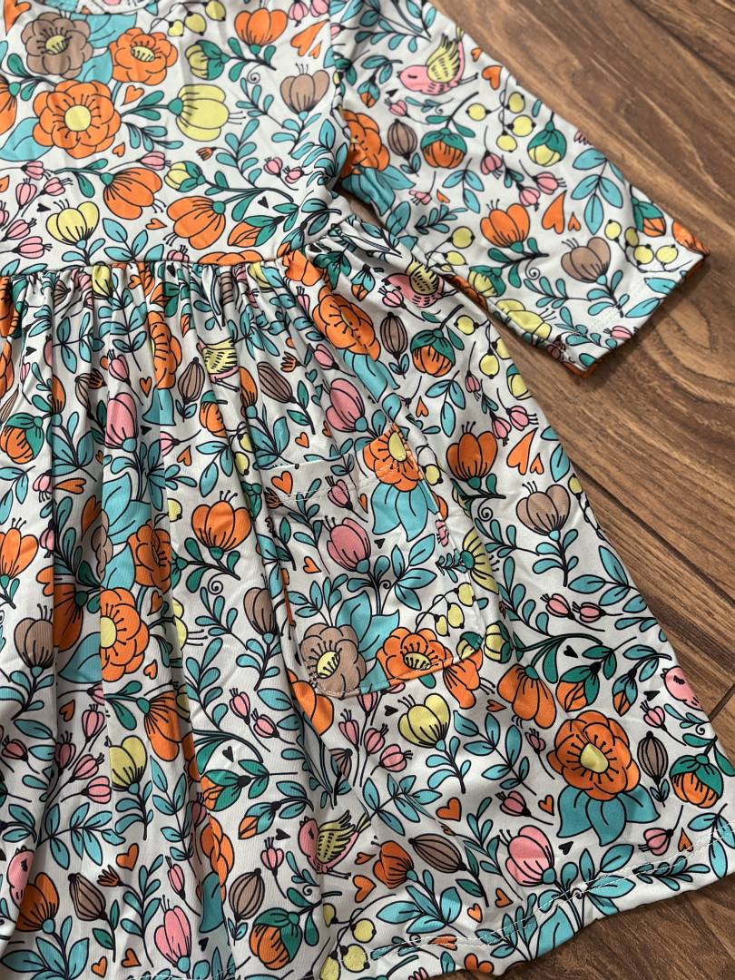 Vintage Vibes 3/4 Pocket Twirl Dress-Floral and leavdes-patterned dress on a wooden floor
